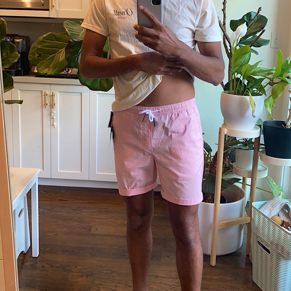 Pink short, with white strings